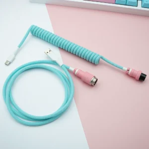 Aqua pink coiled cable usb c gx16 top view Custom keyboard cable featuring a coiled section in light blue, USB-C and aviator connectors, with pink accents and durable paracord braiding.
