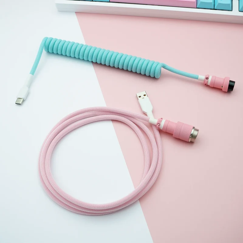 Aqua pink coiled cable usb c top view Custom keyboard cable featuring a coiled section in light blue