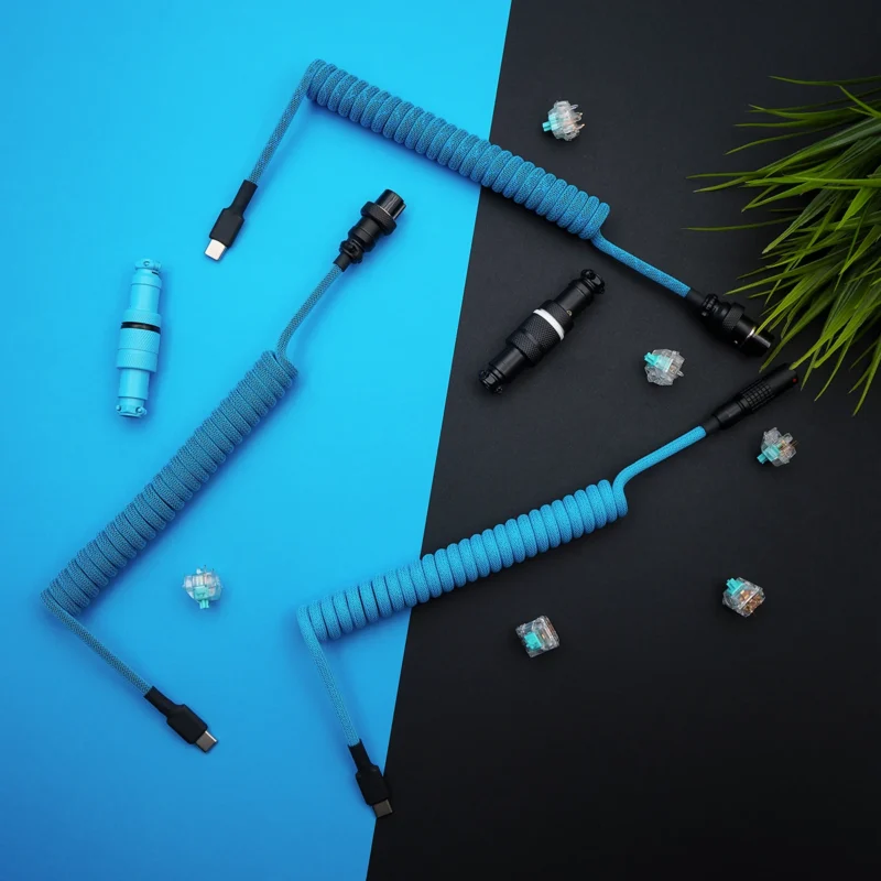 Blue coiled cable overhead usb c aviator Custom coiled keyboard cable in vibrant blue paracord. Features USB-C and aviator connectors