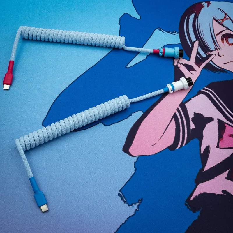 Blue coiled cable usb c anime mat overhead Coiled keyboard cable in blue with red and white connectors. Features include a USB-C end and aviator connector