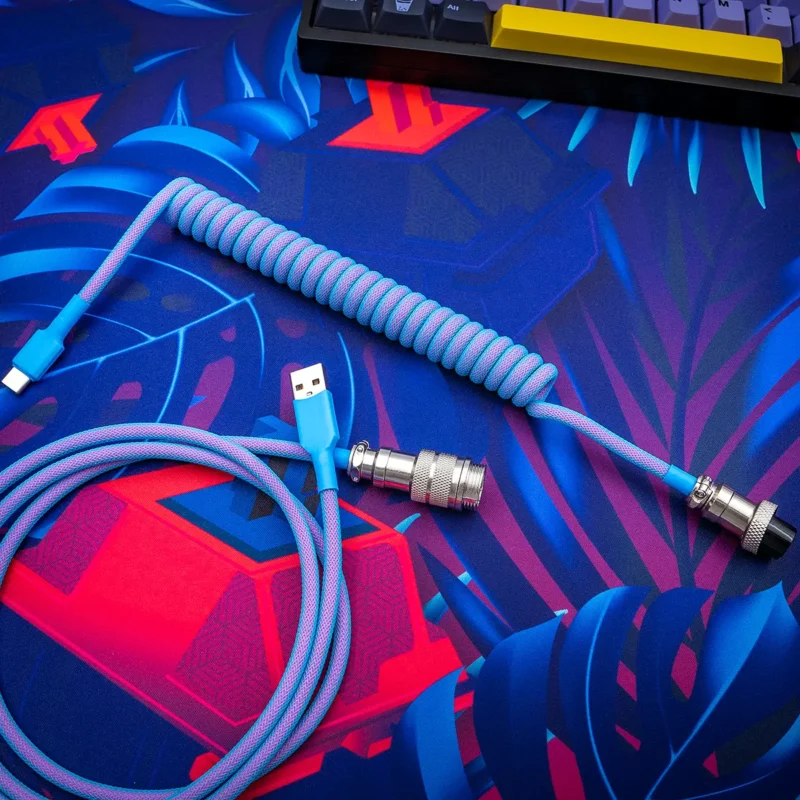 Blue pink coiled cable usb c gx16 overhead Colorful GMK Vaporwave keyboard cable with a coiled design and detachable USB-C and aviator connectors. Ideal for customizing your gaming setup.