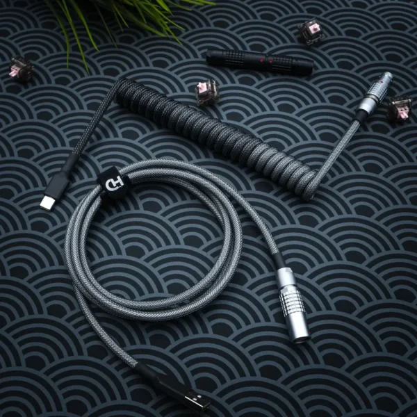 Dark gray keyboard cable featuring a coiled design