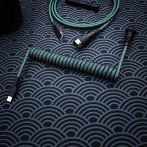Green coiled cable usb c overhead pattern A vibrant green coiled keyboard cable