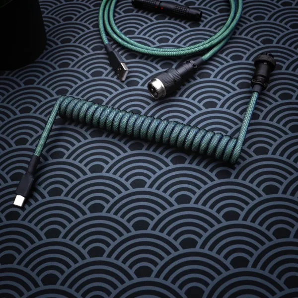 A vibrant green coiled keyboard cable