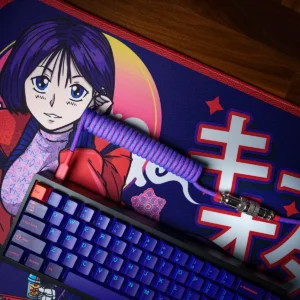 Laser coiled keyboard cable aviator gx16 silver A mechanical keyboard with purple and blue keys and a Laser coiled keyboard cable aviator gx16 silver rests on a colorful anime-themed desk mat featuring a girl with purple hair