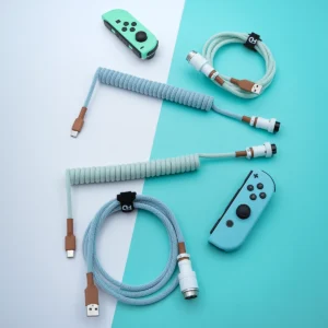 Mint blue coiled cables usb c overhead Coiled PBT Islander keyboard cable featuring USB-C and aviator connectors