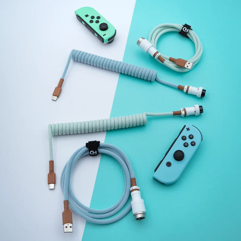 Mint blue coiled cables usb c overhead Coiled PBT Islander keyboard cable featuring USB-C and aviator connectors