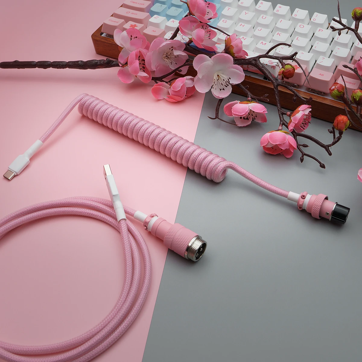 Pink coiled cable angled sakura gx16 aviator Stylish pink JTK NightSakura keyboard cable featuring a coiled section, USB-C and aviator connectors, and durable paracord for a sleek finish.