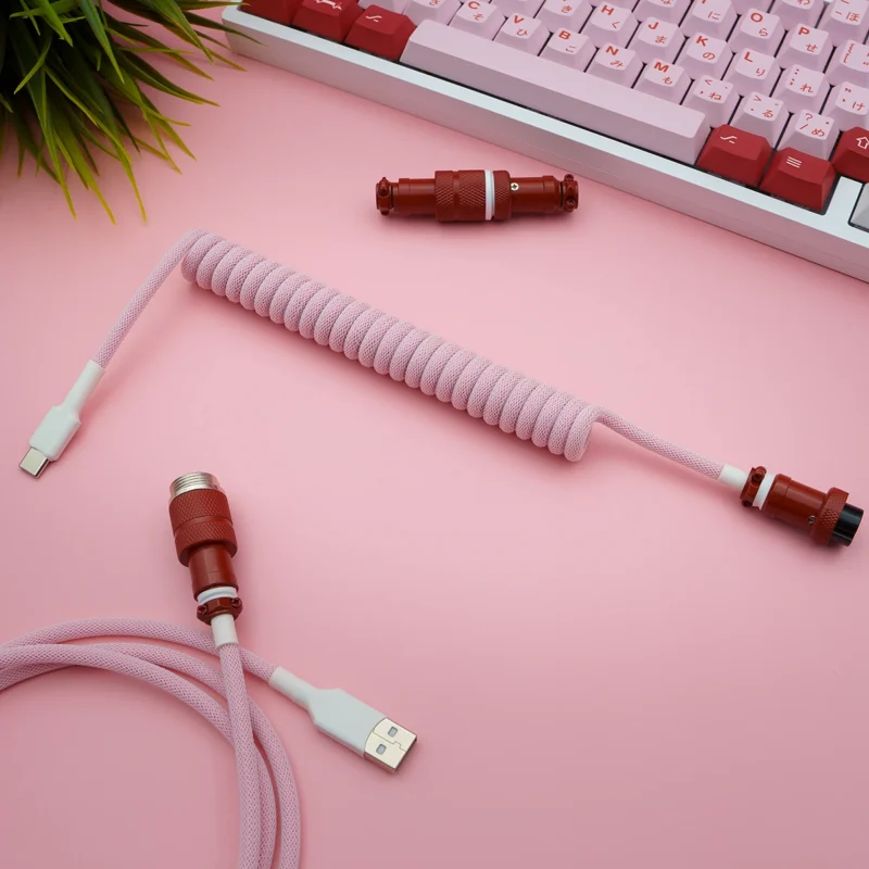 Pink coiled cable usb c gx16 top view Custom GMK Darling keyboard cable featuring a pink coiled paracord design