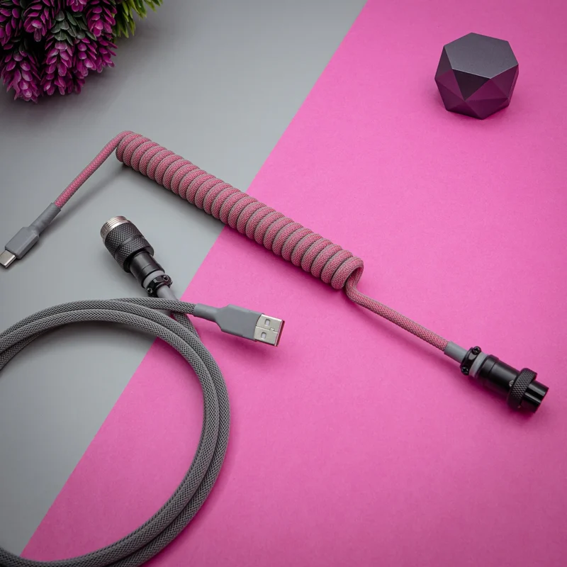 Pink gray coiled cable usb c aviator overhead A stylish gray paracord keyboard cable featuring a coiled section and a straight segment