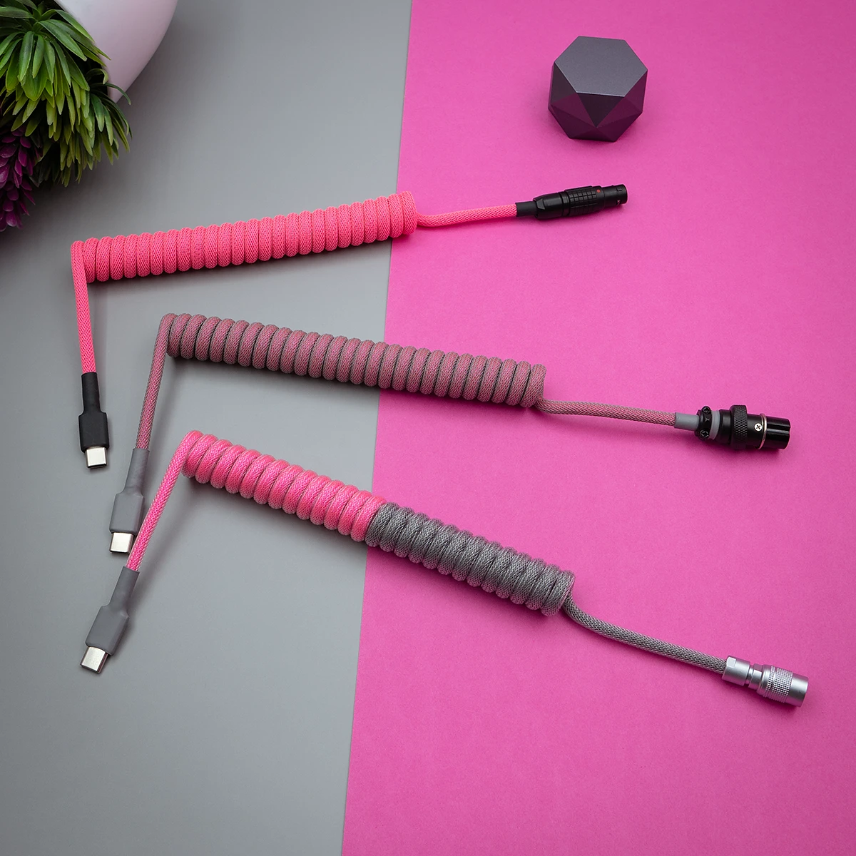 Pink gray coiled cables overhead usb c Three custom keyboard cables feature vibrant pink and gray paracord braiding. Each has detachable connectors: USB-C, micro-USB, and aviator style.