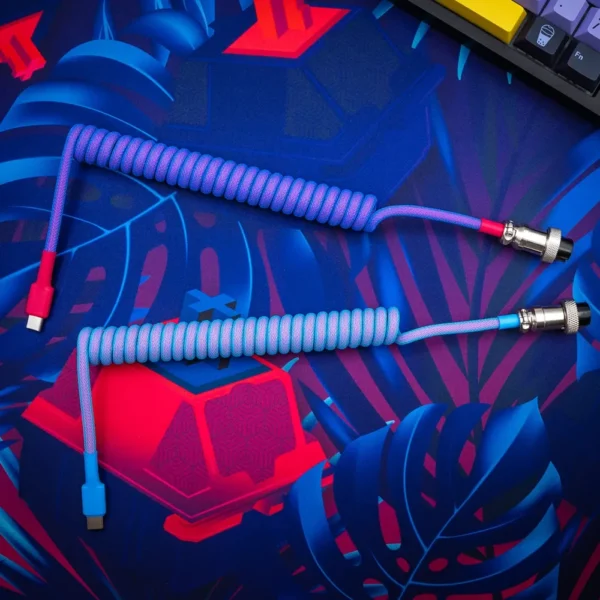 Purple blue coiled cable overhead gx16 plug Coiled GMK Vaporwave keyboard cable featuring vibrant braided paracord