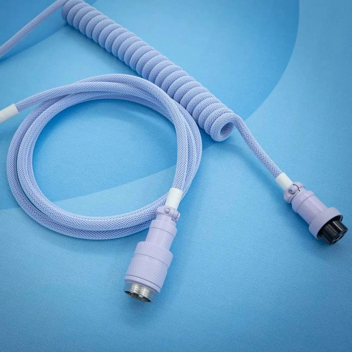 Purple coiled cable frost witch A vibrant purple keyboard cable featuring a coiled design and smooth paracord finish. Includes detachable connectors: USB-C and purple aviator gx16 types for versatile use.