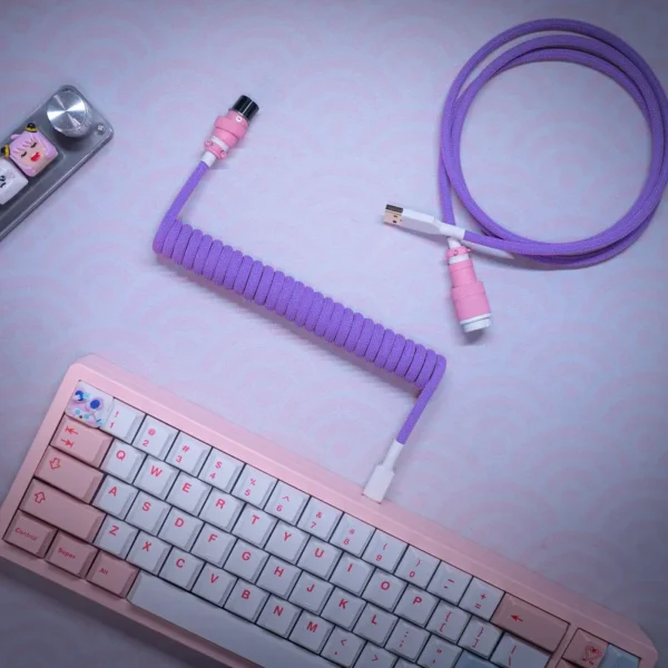 Purple coiled cable usb c top view Coiled purple keyboard cable featuring detachable USB-C and GX16 connectors, with a smooth finish and matching pink accents for a stylish look.