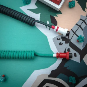 Teal red coiled cables overhead gx16 connectors A vibrant GMK Deku keyboard cable featuring a coiled design, detachable connectors, and high-quality braiding in teal and black. Perfect for customization!