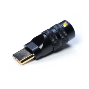 A close-up of a USB Type-C featuring a gold-plated connector and black textured metal housing CNC-machined for durability, placed on a white background.