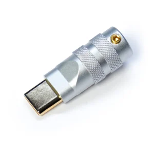 Usb type c connector housing cnc silver A close-up of a metallic USB Type C featuring silver Housing CNC precision, with a textured grip and a gold-plated connector, photographed on a light background.