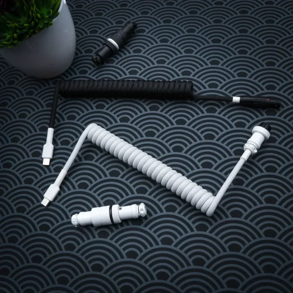 White black coiled cables usb c overhead Custom keyboard cable featuring a white and black coiled and USB-C connector. Includes a detachable